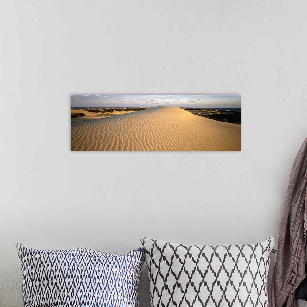 A bohemian room featuring Sand dune at sunset, Outer Banks, North Carolina,
