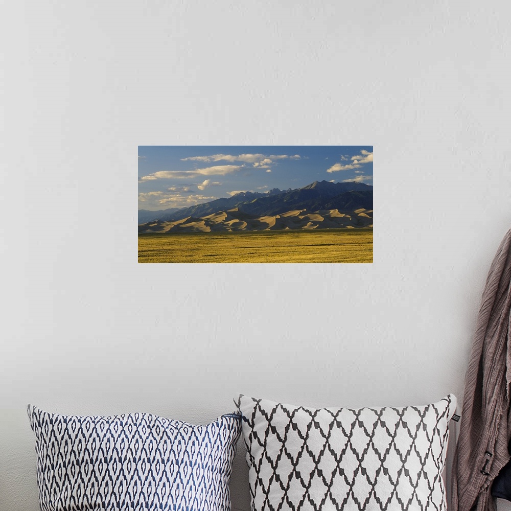 A bohemian room featuring Sand dunes on a landscape, Great Sand Dunes National Monument, San Luis Valley, Colorado