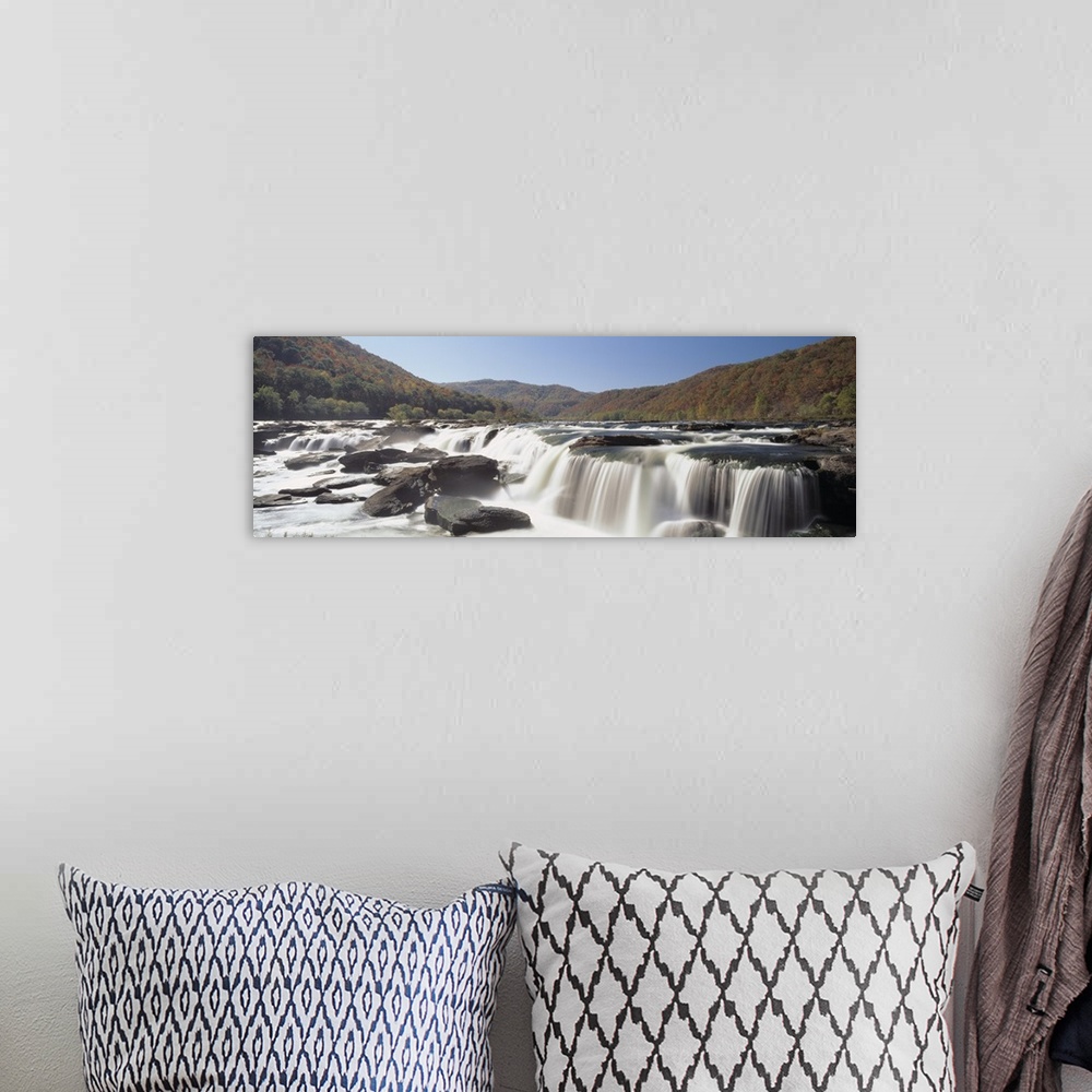A bohemian room featuring Panoramic image on canvas of long waterfalls with rolling mountains of fall foliage in the backgr...