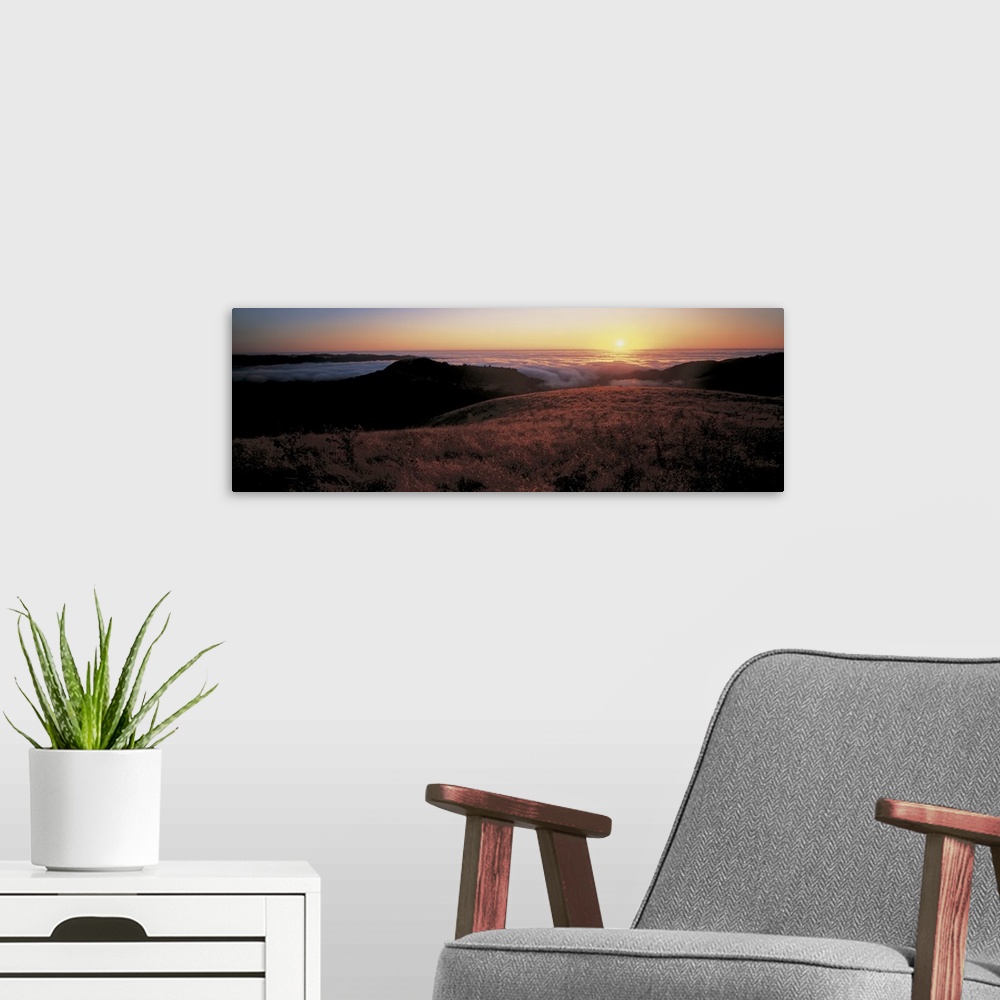 A modern room featuring Santa Cruz Mountains at sunset CA