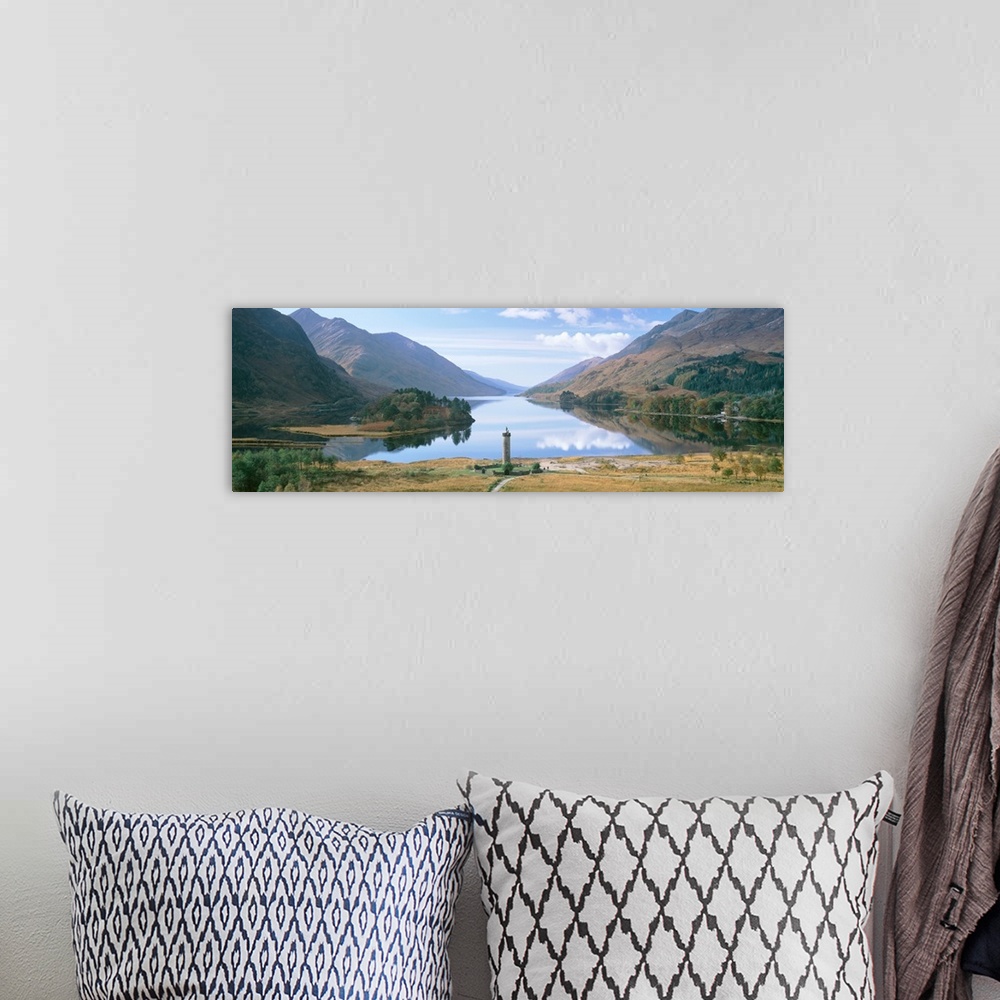 A bohemian room featuring Scotland, Highlands, Loch Shiel Glenfinnan Monument, Reflection of cloud in the lake