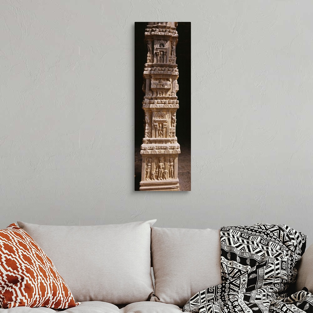 A bohemian room featuring Sculptures carved on a column, Tamil Nadu, India