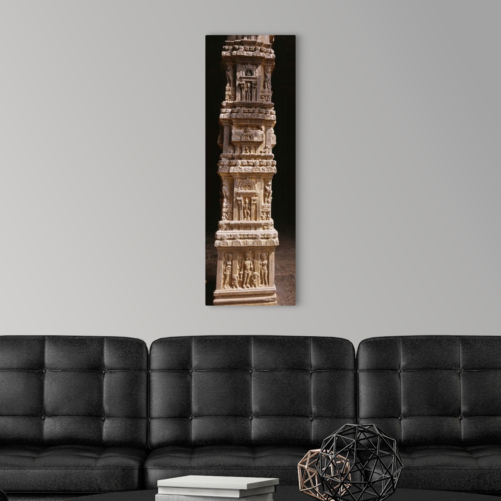 A modern room featuring Sculptures carved on a column, Tamil Nadu, India