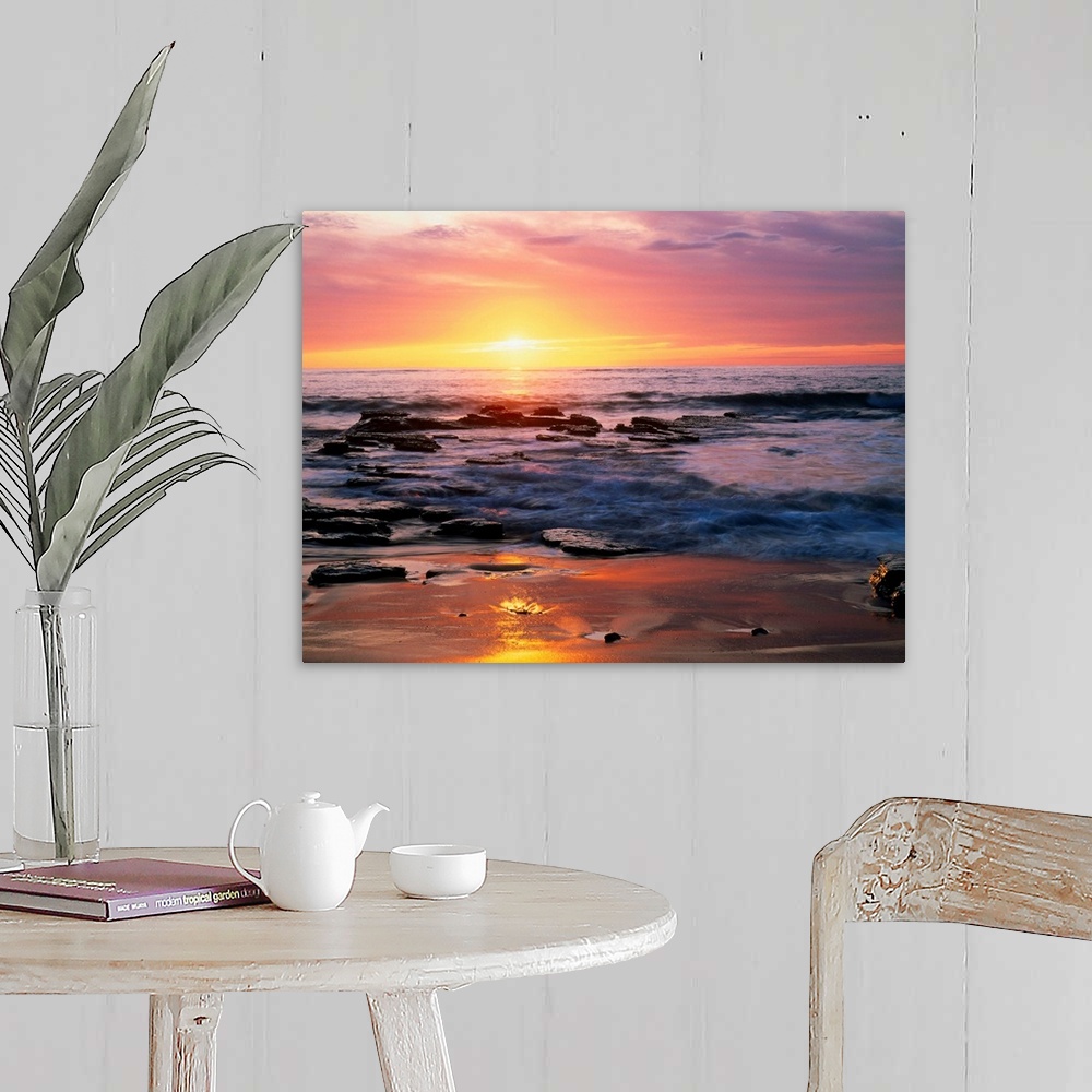 A farmhouse room featuring Photograph of rocky shoreline at sunset with a cloudy sky.