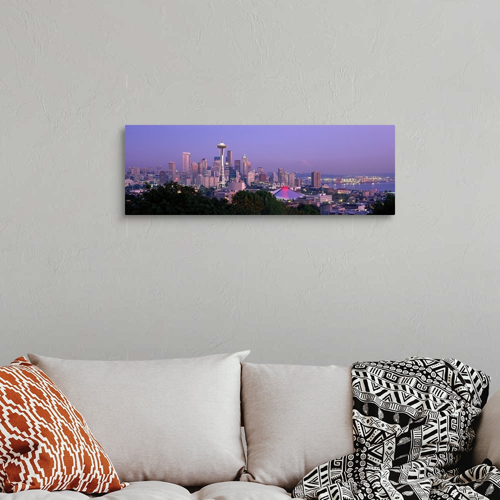 A bohemian room featuring Panoramic view of the Seattle, Washington skyline in the early evening, with the Space needle cle...