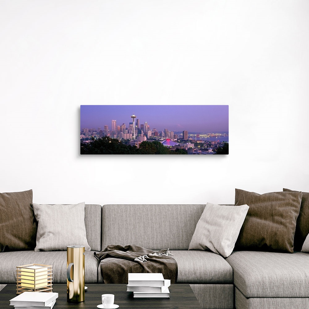 A traditional room featuring Panoramic view of the Seattle, Washington skyline in the early evening, with the Space needle cle...