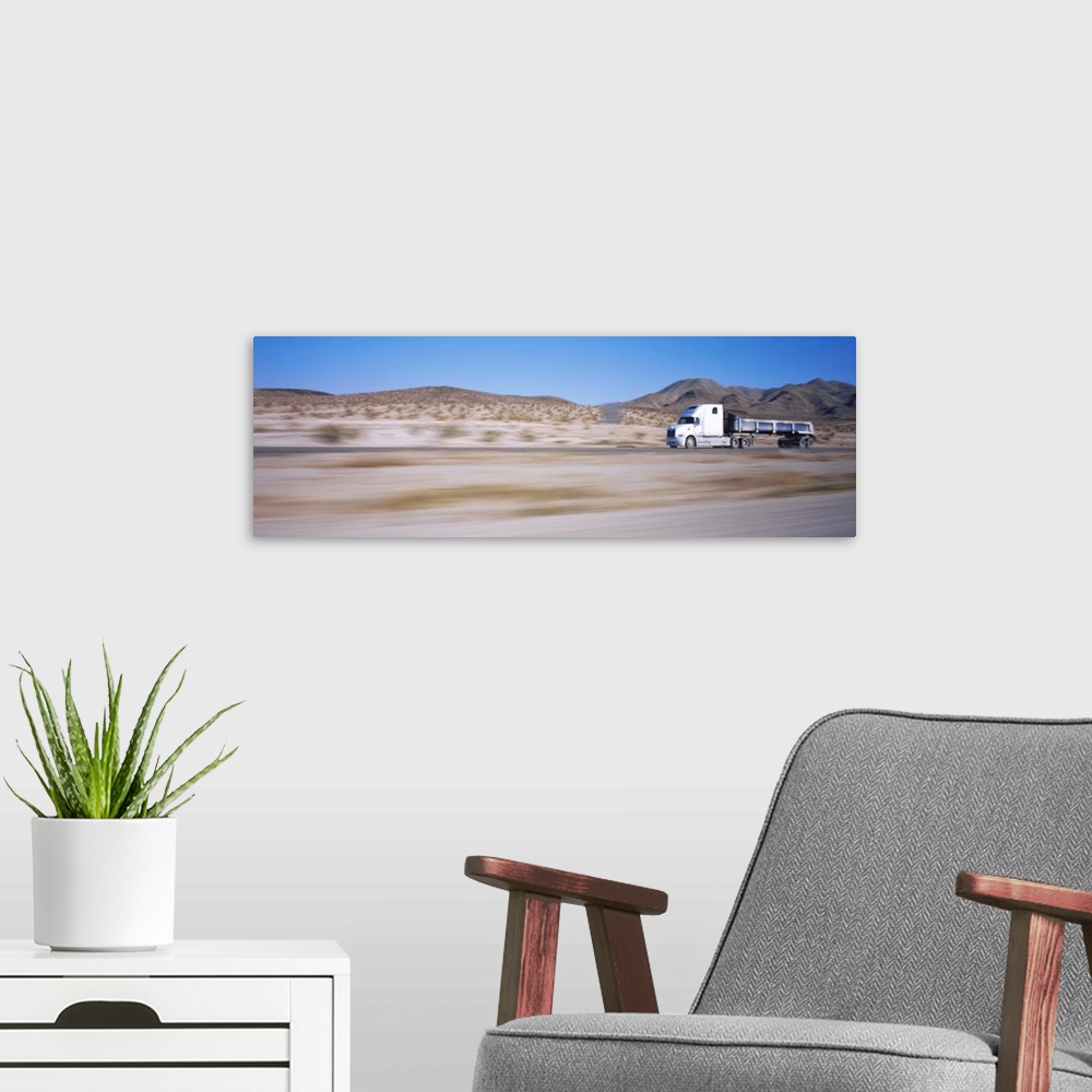 A modern room featuring Semi-truck on a highway
