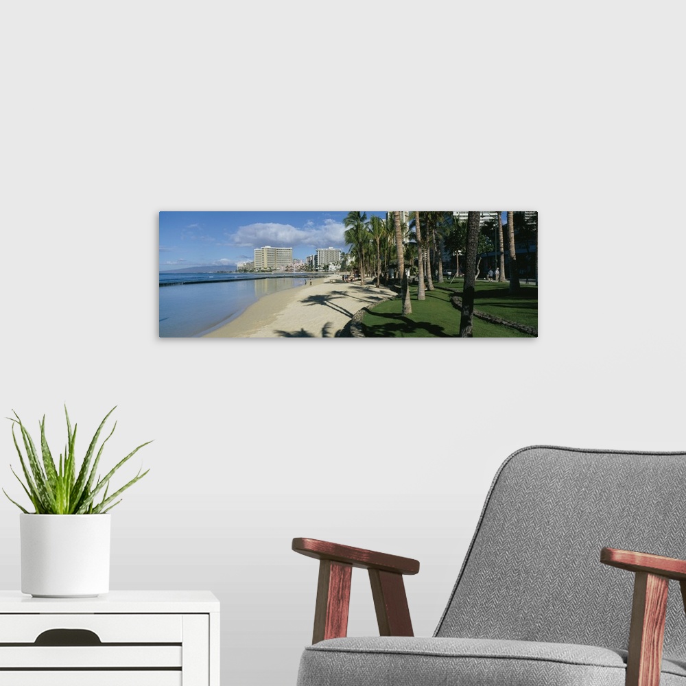 A modern room featuring Shadow of palm trees on the beach, Waikiki Beach, Waikiki, Oahu, Hawaii