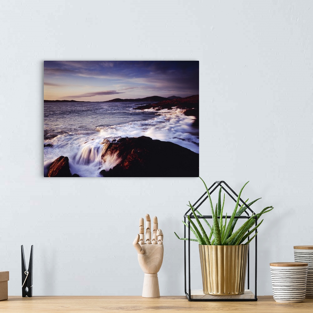 A bohemian room featuring Horizontal photograph of water crashing into the rocky shoreline of Outer Hebrides as the sun set...