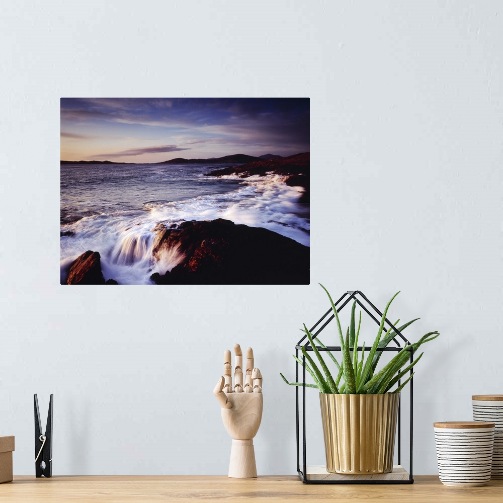 A bohemian room featuring Horizontal photograph of water crashing into the rocky shoreline of Outer Hebrides as the sun set...