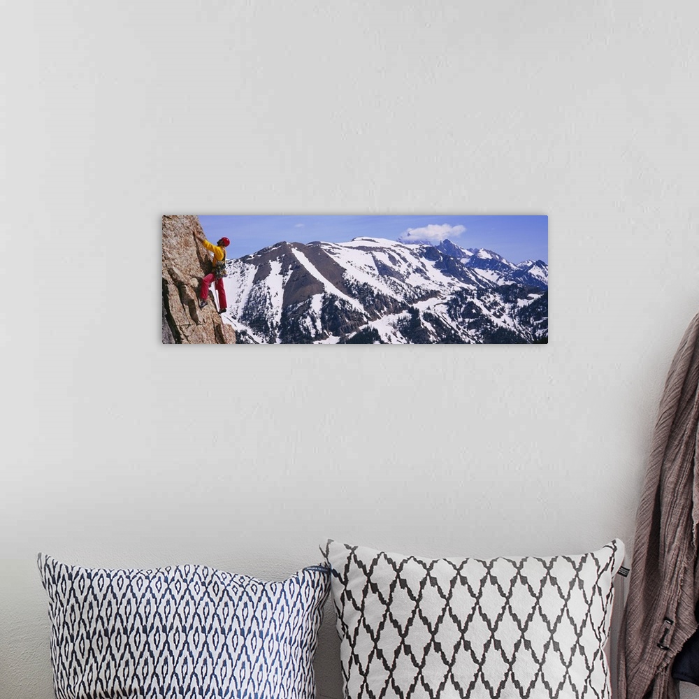 A bohemian room featuring Side profile of a person rock climbing, Rendezvous Mountains, Grand Teton National Park, Wyoming