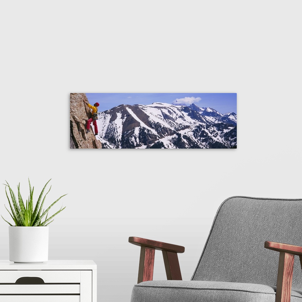 A modern room featuring Side profile of a person rock climbing, Rendezvous Mountains, Grand Teton National Park, Wyoming