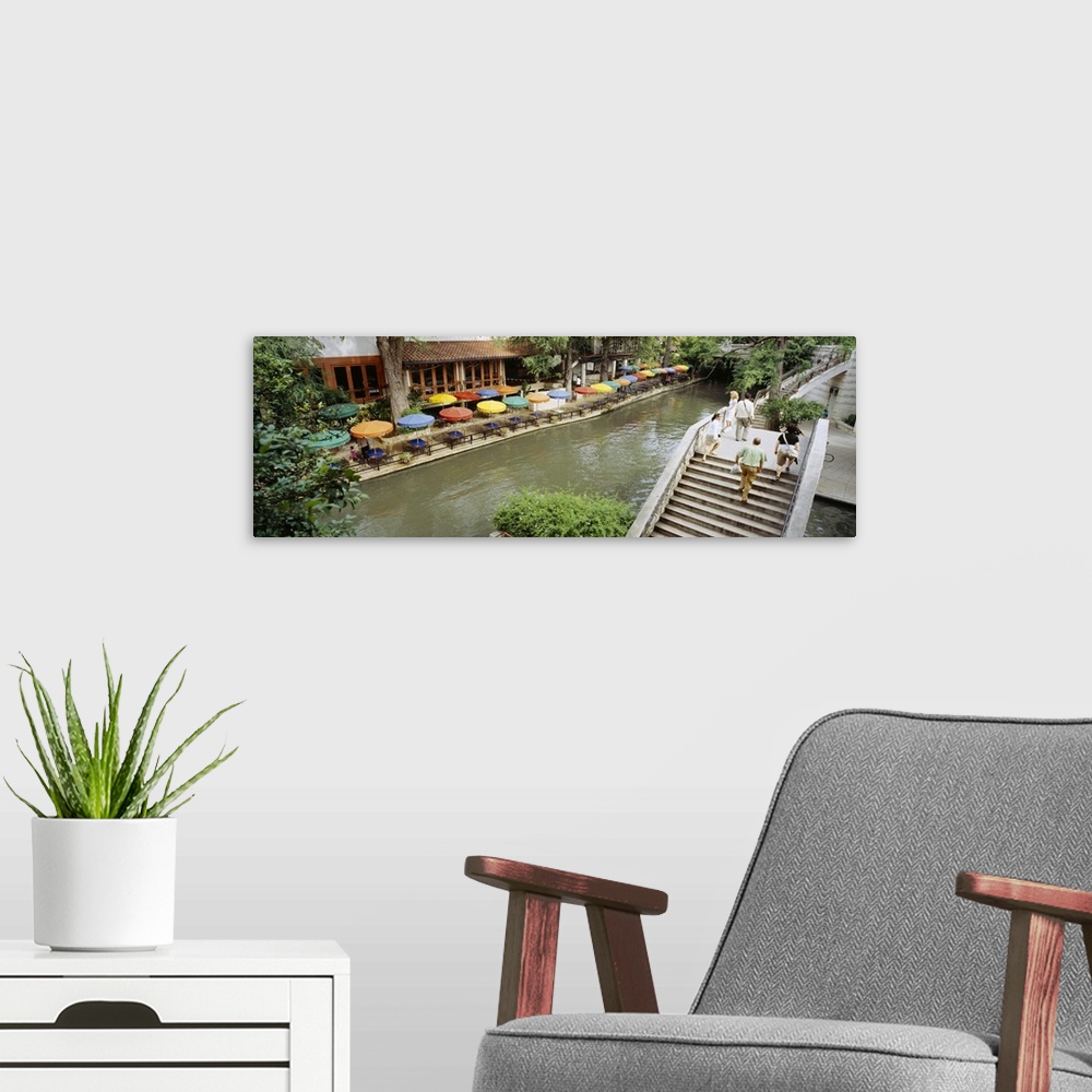 A modern room featuring Sidewalk cafes along a river, San Antonio River Walk, San Antonio River, San Antonio, Bexar Count...
