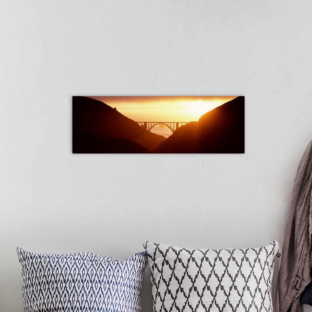 A bohemian room featuring Silhouette of a bridge at sunset, Bixby Bridge, Big Sur, California,