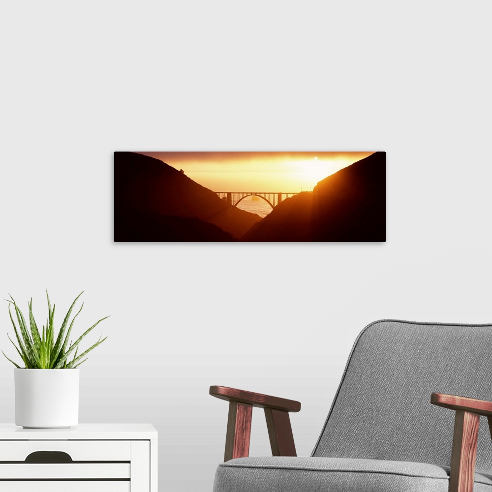 A modern room featuring Silhouette of a bridge at sunset, Bixby Bridge, Big Sur, California,