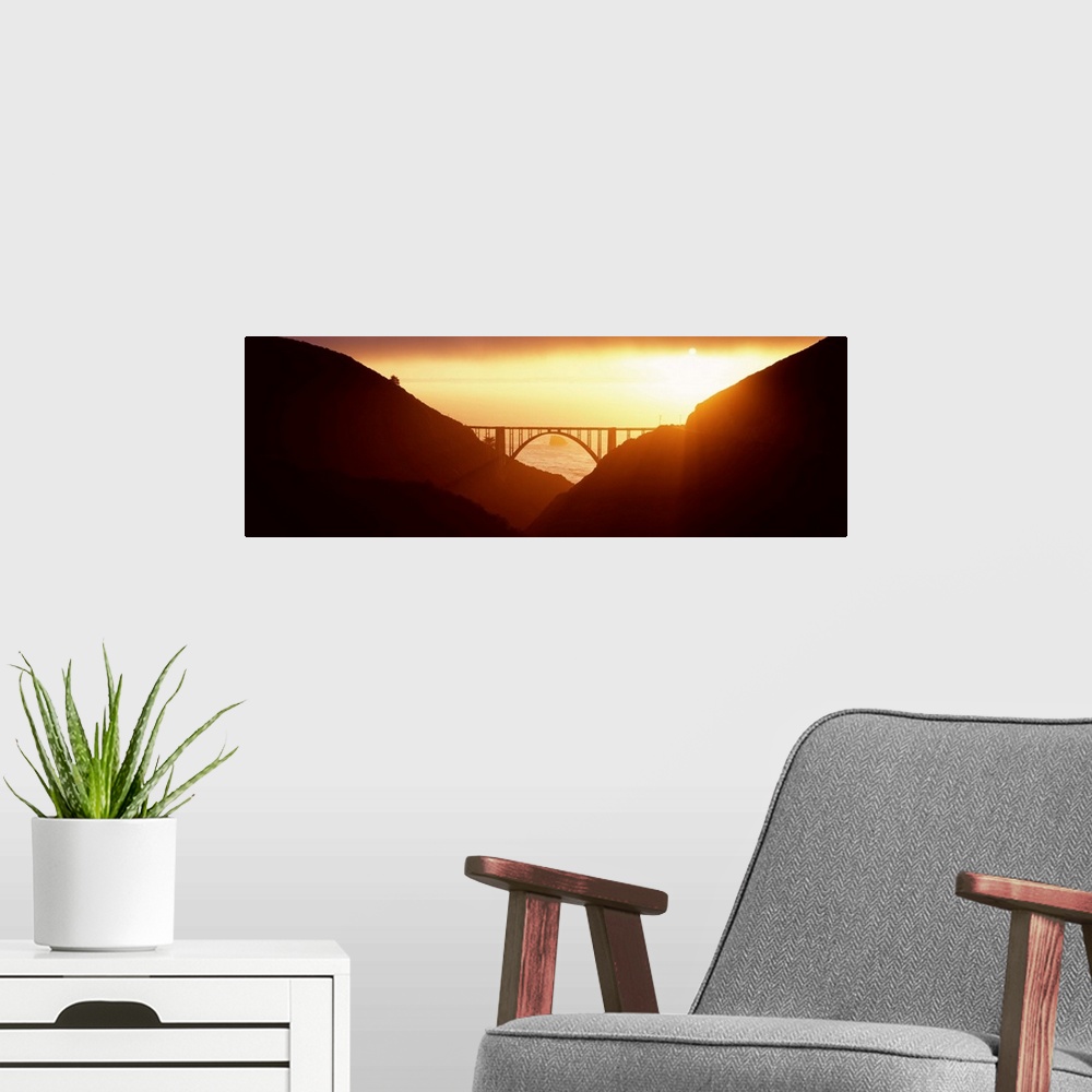 A modern room featuring Silhouette of a bridge at sunset, Bixby Bridge, Big Sur, California,