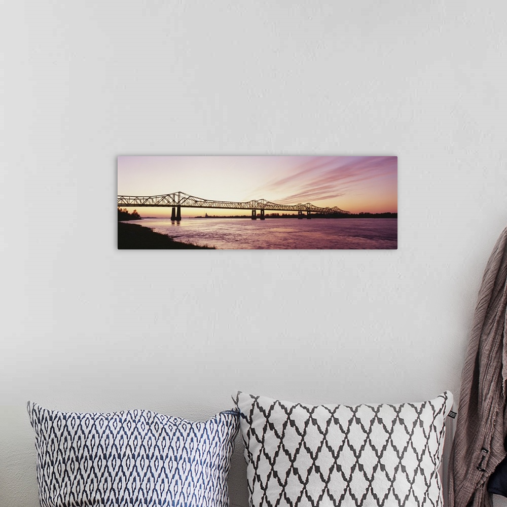 A bohemian room featuring Silhouette of a bridge over a river, Crescent City Connection Bridge, Mississippi River, Natchez,...