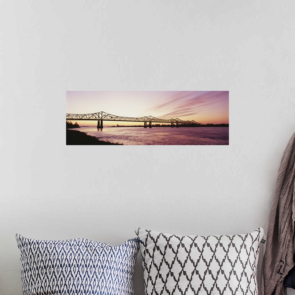 A bohemian room featuring Silhouette of a bridge over a river, Crescent City Connection Bridge, Mississippi River, Natchez,...
