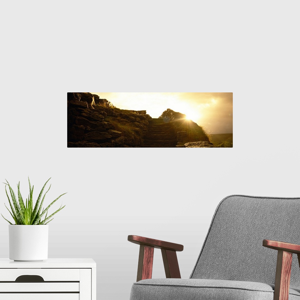 A modern room featuring Silhouette of a cave at sunset, Ailwee Cave, County Clare, Republic Of Ireland