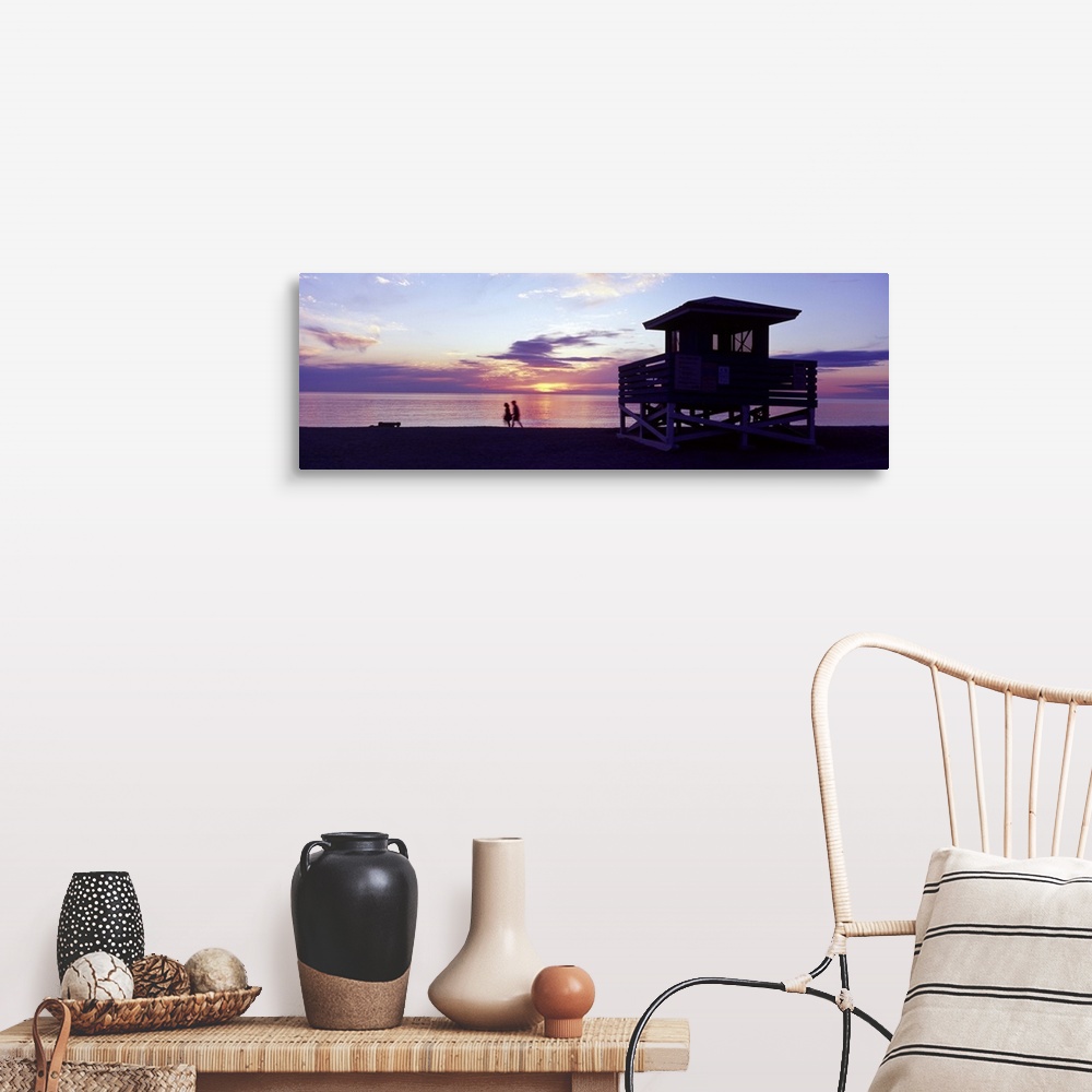 A farmhouse room featuring Silhouette of a couple walking on the beach Gulf of Mexico Florida