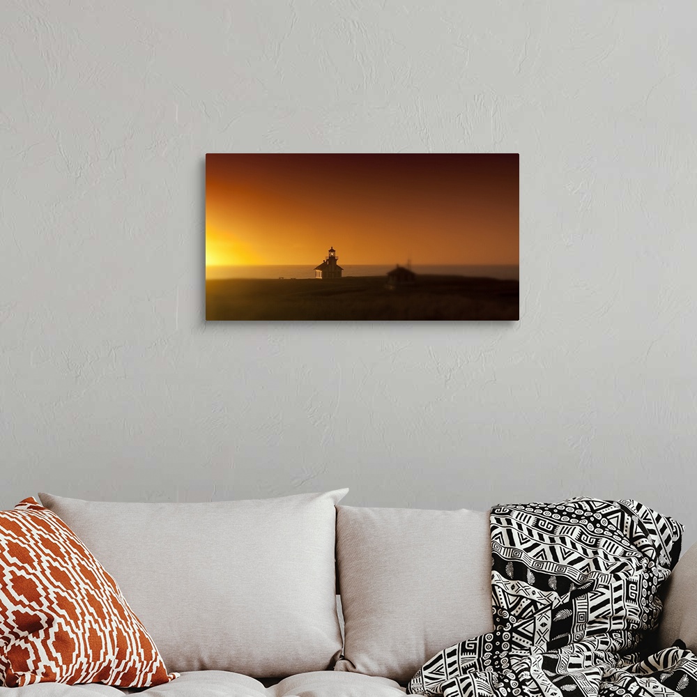 A bohemian room featuring Silhouette of a lighthouse at sunset, Point Cabrillo Light, Fort Bragg, Mendocino County, California