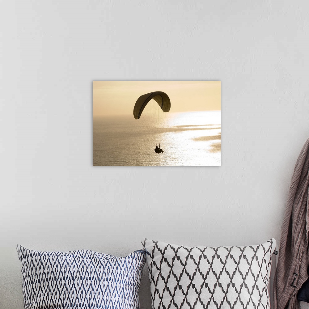 A bohemian room featuring Silhouette of a paraglider flying over an ocean, Pacific Ocean, San Diego, California