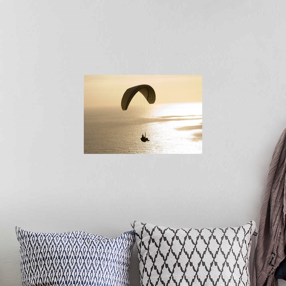 A bohemian room featuring Silhouette of a paraglider flying over an ocean, Pacific Ocean, San Diego, California