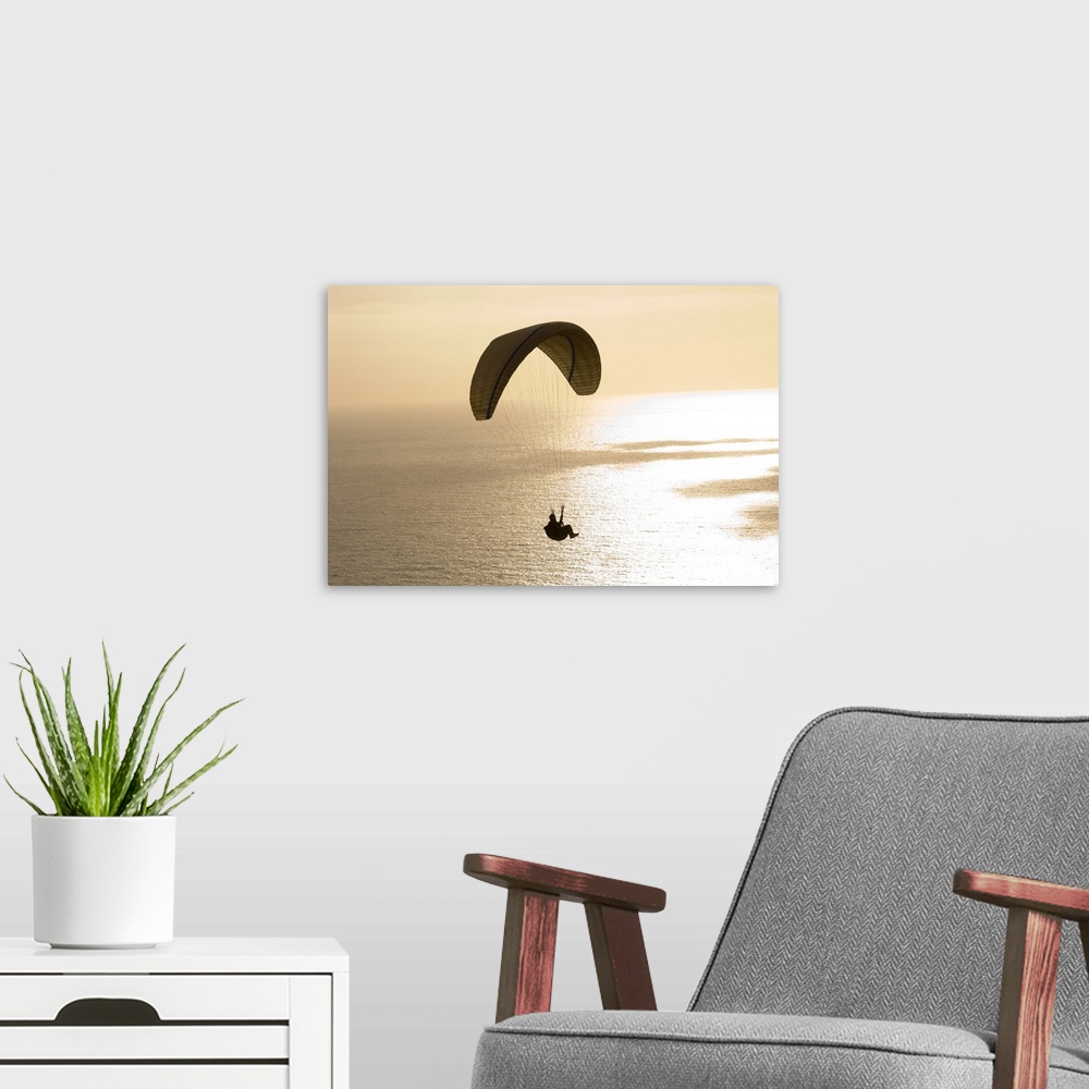 A modern room featuring Silhouette of a paraglider flying over an ocean, Pacific Ocean, San Diego, California