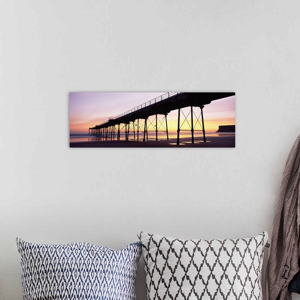 A bohemian room featuring Silhouette of a pier at dusk Saltburn Pier Saltburn By The Sea Redcar And Cleveland North Yorkshi...
