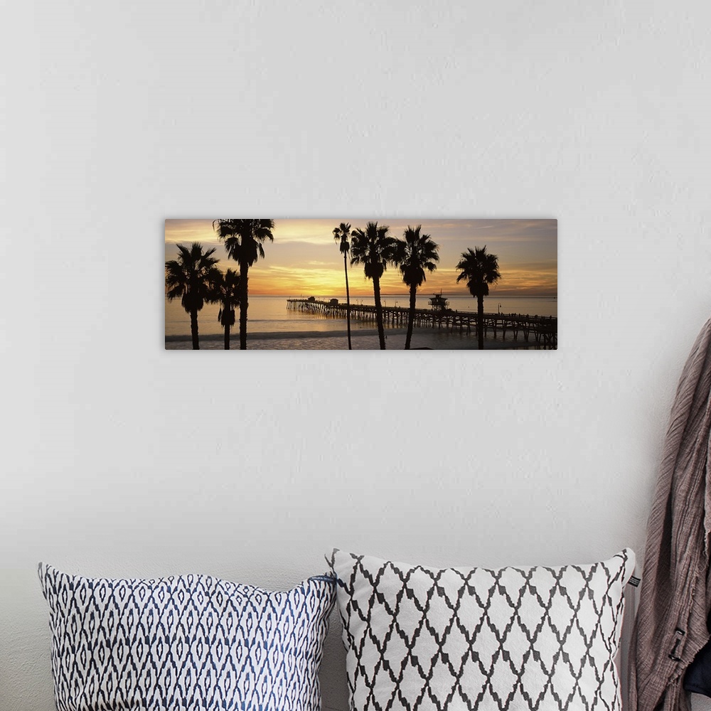 A bohemian room featuring Panoramic image of the San Clemente Pier at sunset in Los Angeles, California.