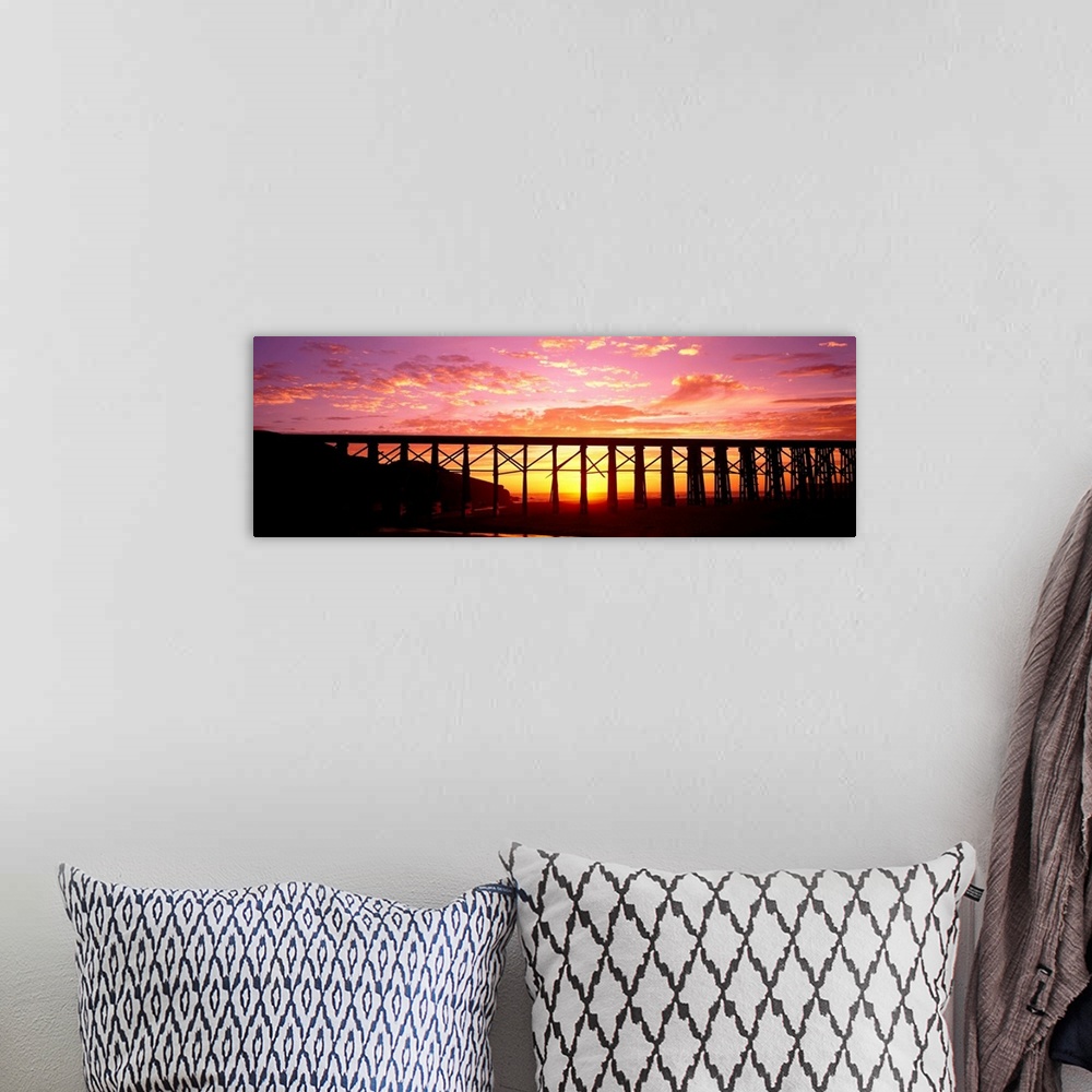 A bohemian room featuring Silhouette of a railway bridge, Fort Bragg, California