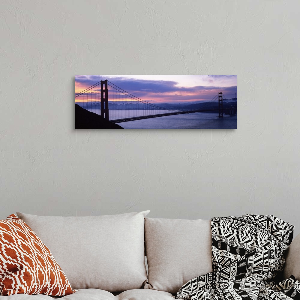 A bohemian room featuring Silhouette of a suspension bridge at dusk, Golden Gate Bridge, San Francisco, California,