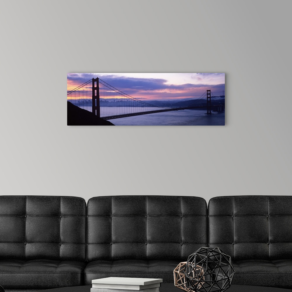 A modern room featuring Silhouette of a suspension bridge at dusk, Golden Gate Bridge, San Francisco, California,