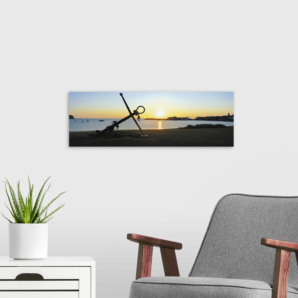A modern room featuring Silhouette of an anchor on the beach at sunrise, North Berwick, East Lothian, Scotland