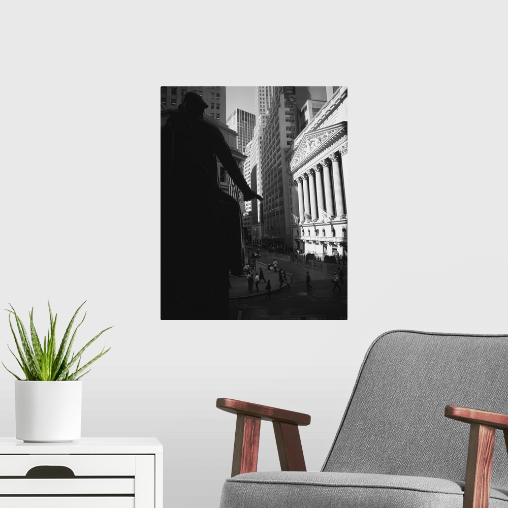 A modern room featuring Vertical photograph on a large wall hanging of a street view of New York City, including the New ...