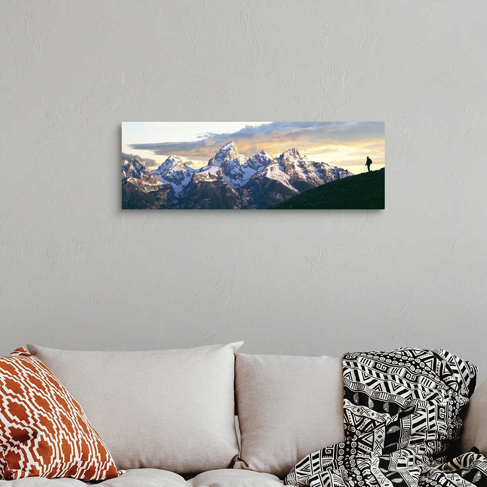 A bohemian room featuring Silhouette of hiker looking at Teton Range from Schwabachers Landing, Grand Teton National Park, ...