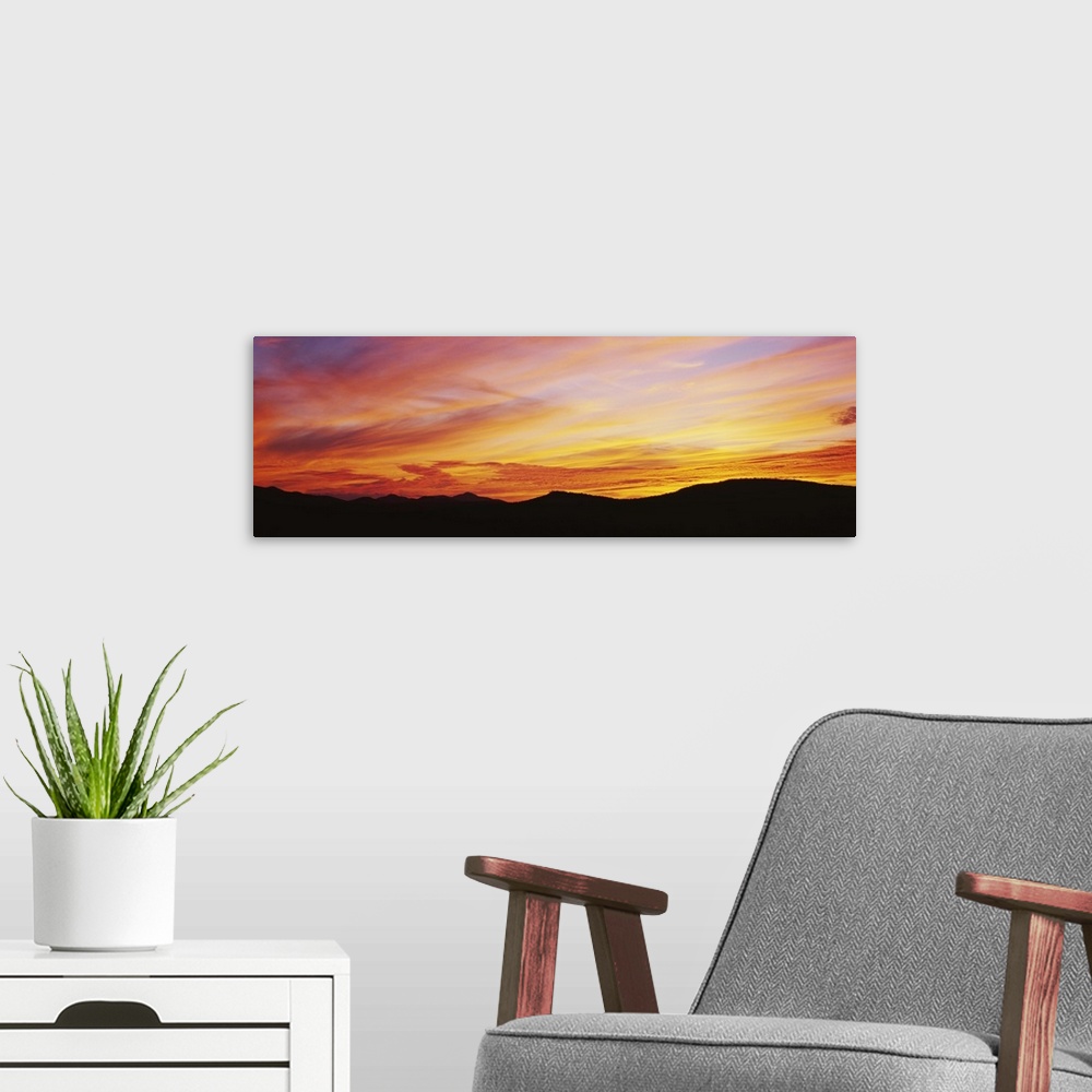 A modern room featuring Silhouette of mountains at sunset, Lake Placid, Adirondack Mountains, New York State
