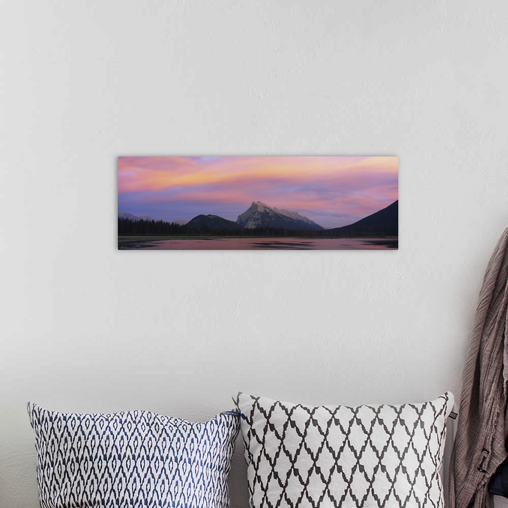 A bohemian room featuring Silhouette of mountains on a landscape, Mount Rundle, Vermillion Lake, Banff, Alberta, Canada.