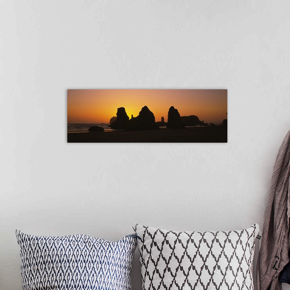 A bohemian room featuring Silhouette of rock formations at sunset, Pacific Ocean, Bandon State Natural Area, Bandon, Oregon