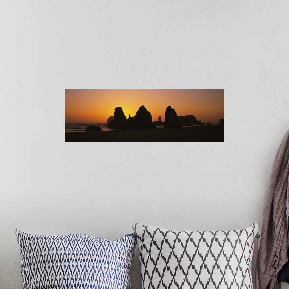 A bohemian room featuring Silhouette of rock formations at sunset, Pacific Ocean, Bandon State Natural Area, Bandon, Oregon