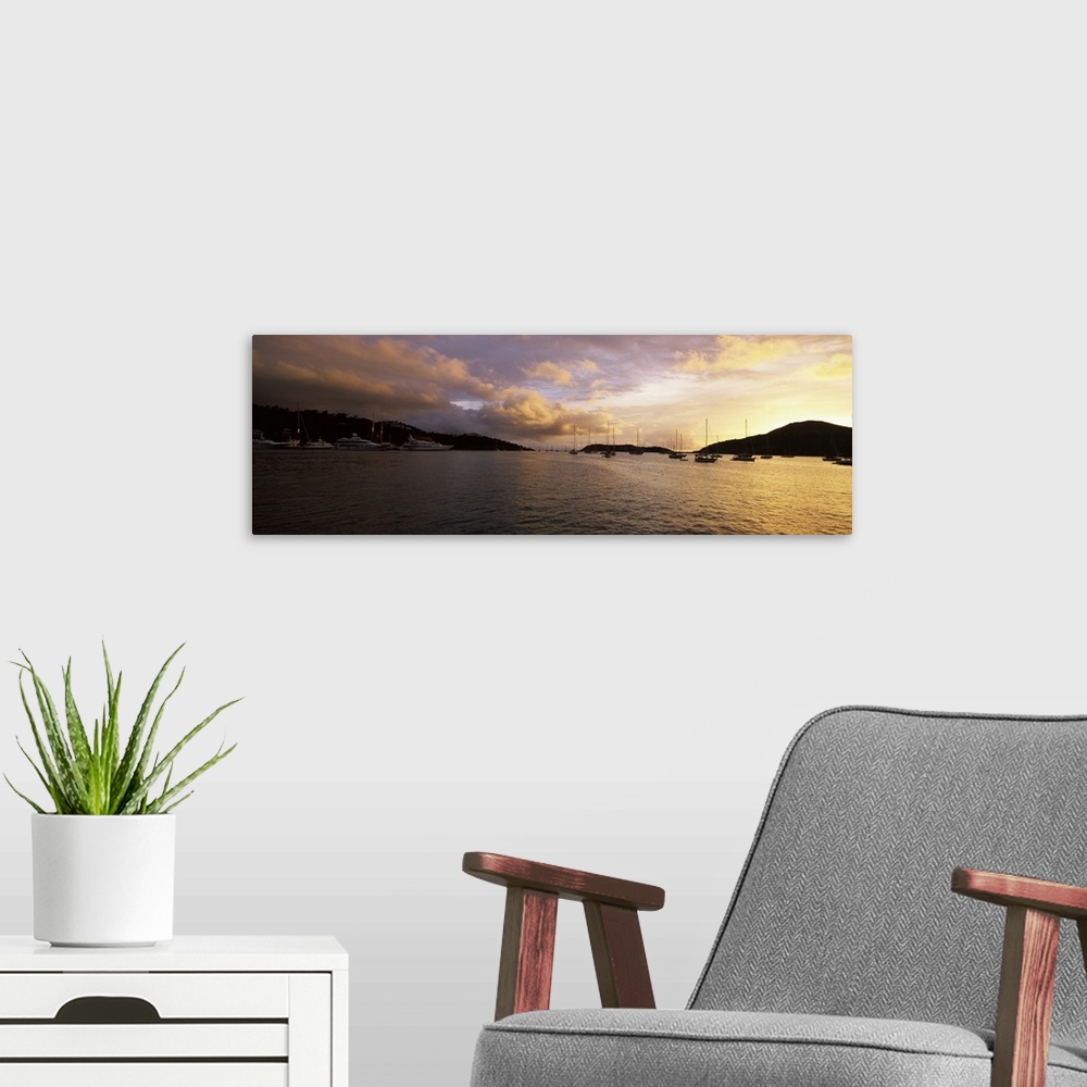 A modern room featuring Silhouette of sailboats and mountain at sunset, English Harbour, Falmouth Bay, Antigua, Antigua a...