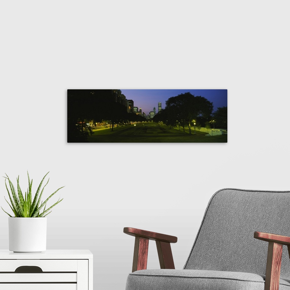 A modern room featuring Silhouette of trees along the street in a cityscape, Grant Park, Chicago, Illinois