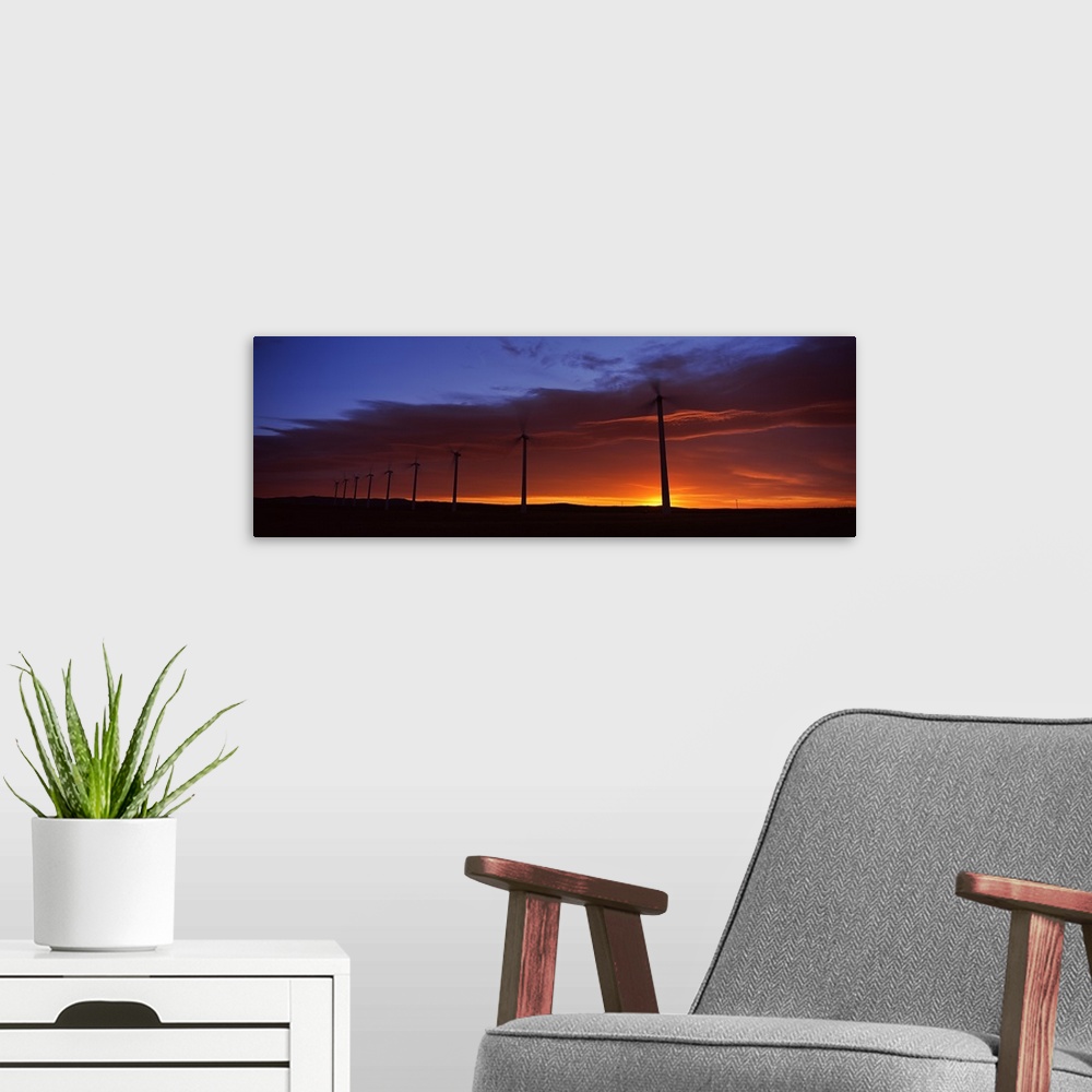 A modern room featuring Silhouette of windmills in a field, Cowley Wind Farm, Cowley, Alberta, Canada