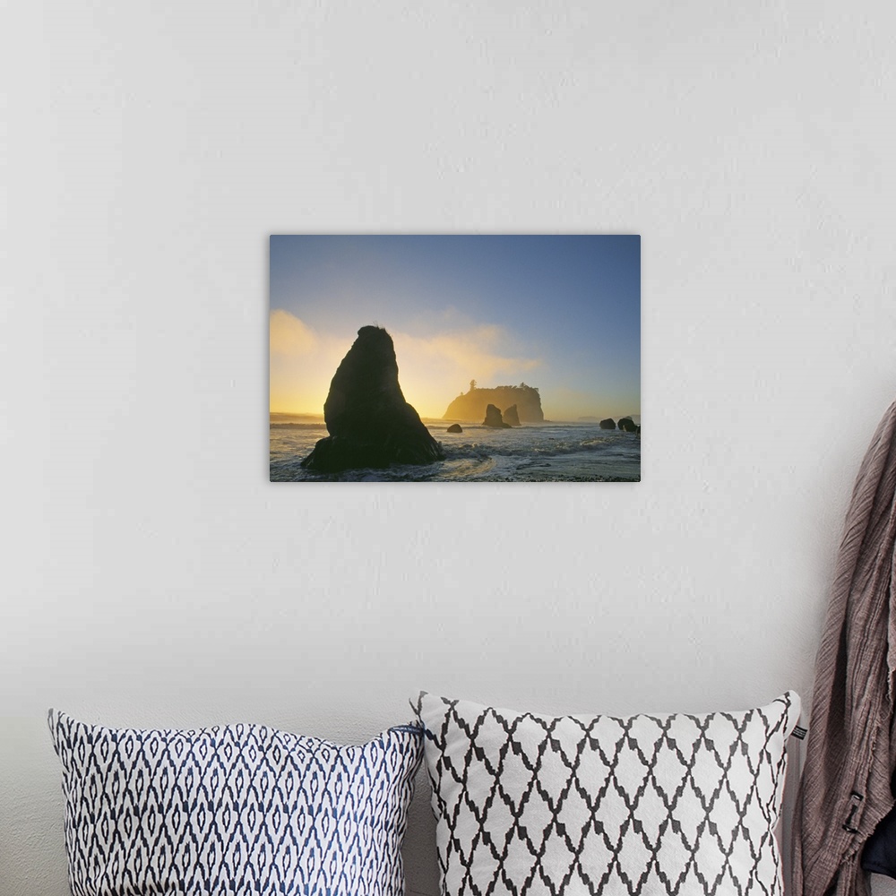 A bohemian room featuring Silhouetted Sea Stacks In Pacific Ocean