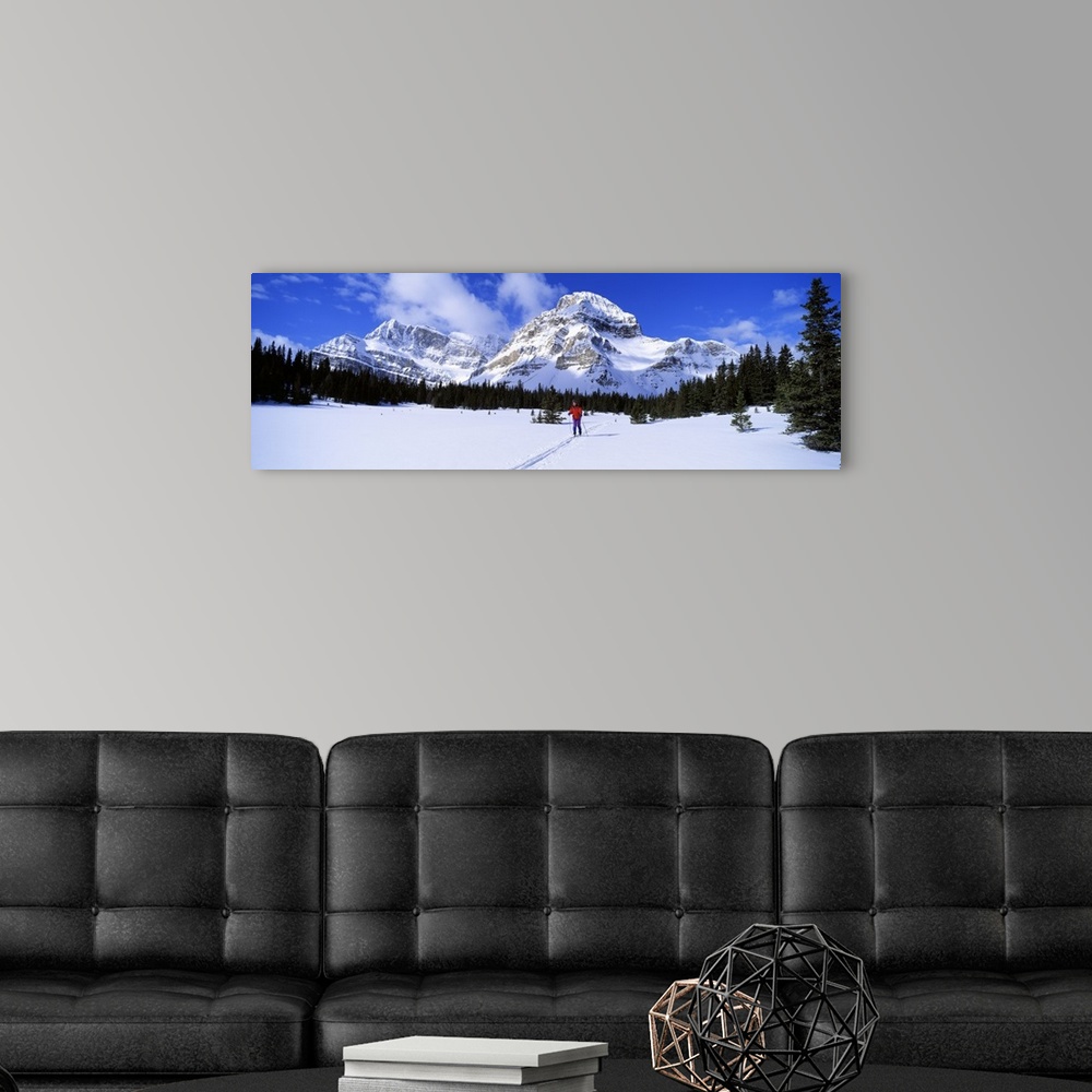 A modern room featuring Skier Ptarmigan Peak Wall of Jericho Skoki Valley Banff National Park Alberta Canada