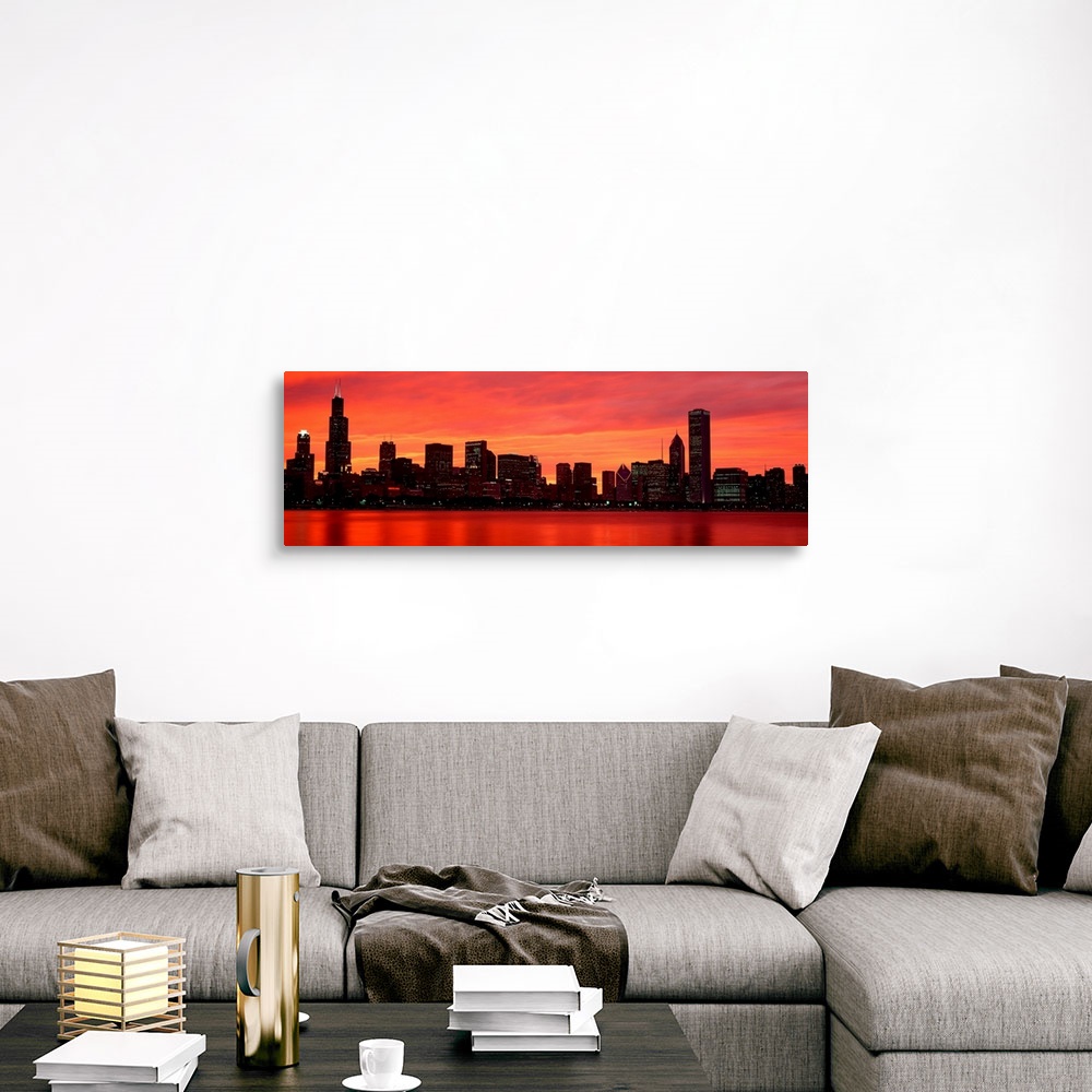 A traditional room featuring Giant landscape wall picture of the Chicago skyline at dusk, reflecting in the waters of Lake Mic...
