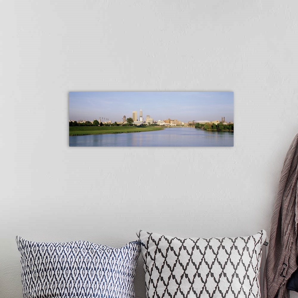 A bohemian room featuring Panoramic photo on canvas of the cityscape of Indianapolis along the waterfront.