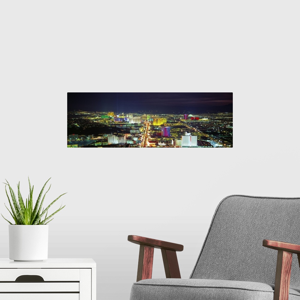 A modern room featuring Giant horizontal panoramic photograph of the Las Vegas, Nevada (NV) skyline and surrounding areas...