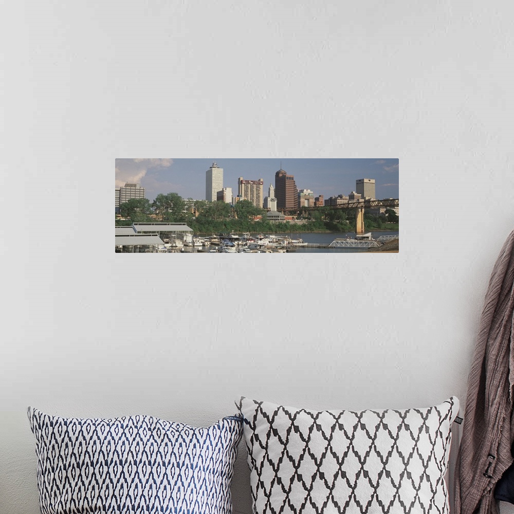 A bohemian room featuring A panoramic view of the Memphis, Tennessee skyline, including boats on the river.