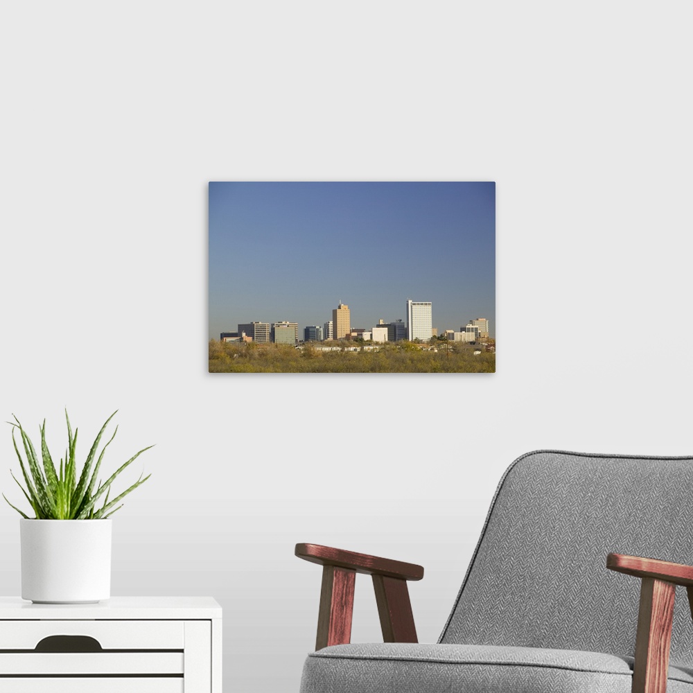 A modern room featuring Skyline of a city, Midland, Texas